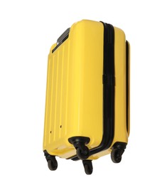 Photo of One new yellow suitcase isolated on white