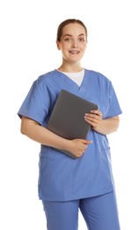 Portrait of smiling nurse with laptop on white background