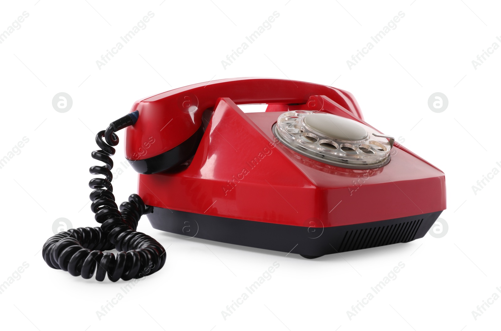 Photo of One red telephone with handset isolated on white