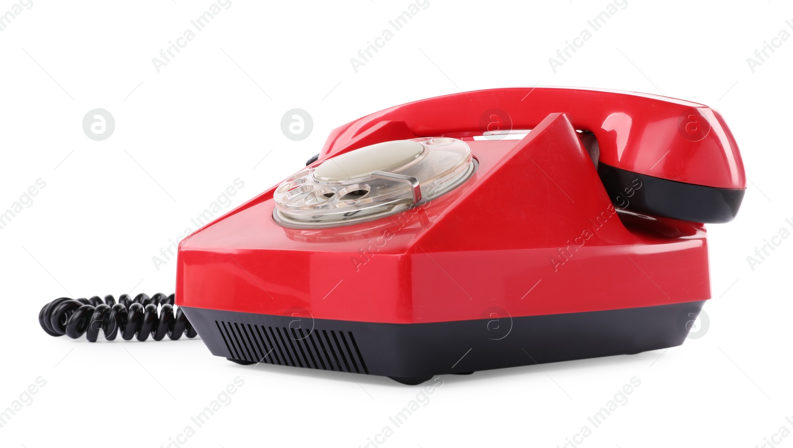 Photo of One red telephone with handset isolated on white