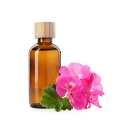 Photo of Geranium essential oil in bottle and beautiful flowers isolated on white