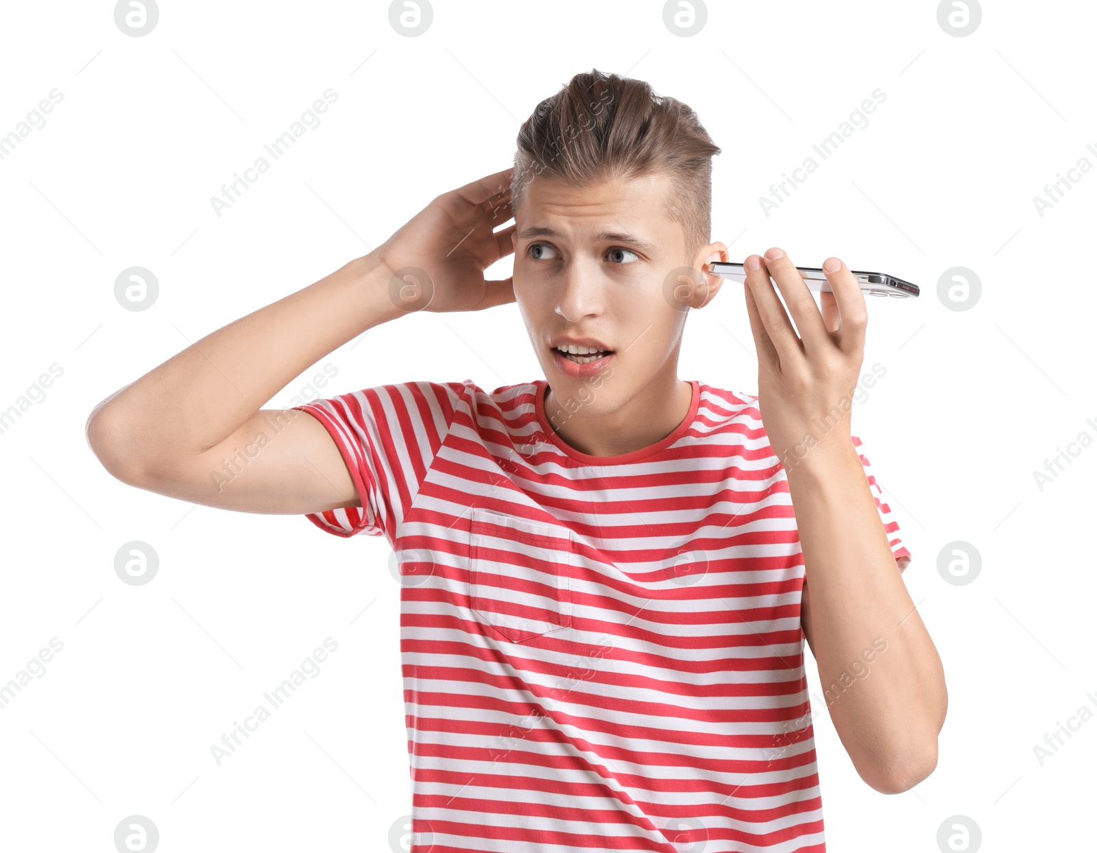 Photo of Young man with smartphone listening to voice message on white background