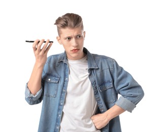 Photo of Young man with smartphone listening to voice message on white background