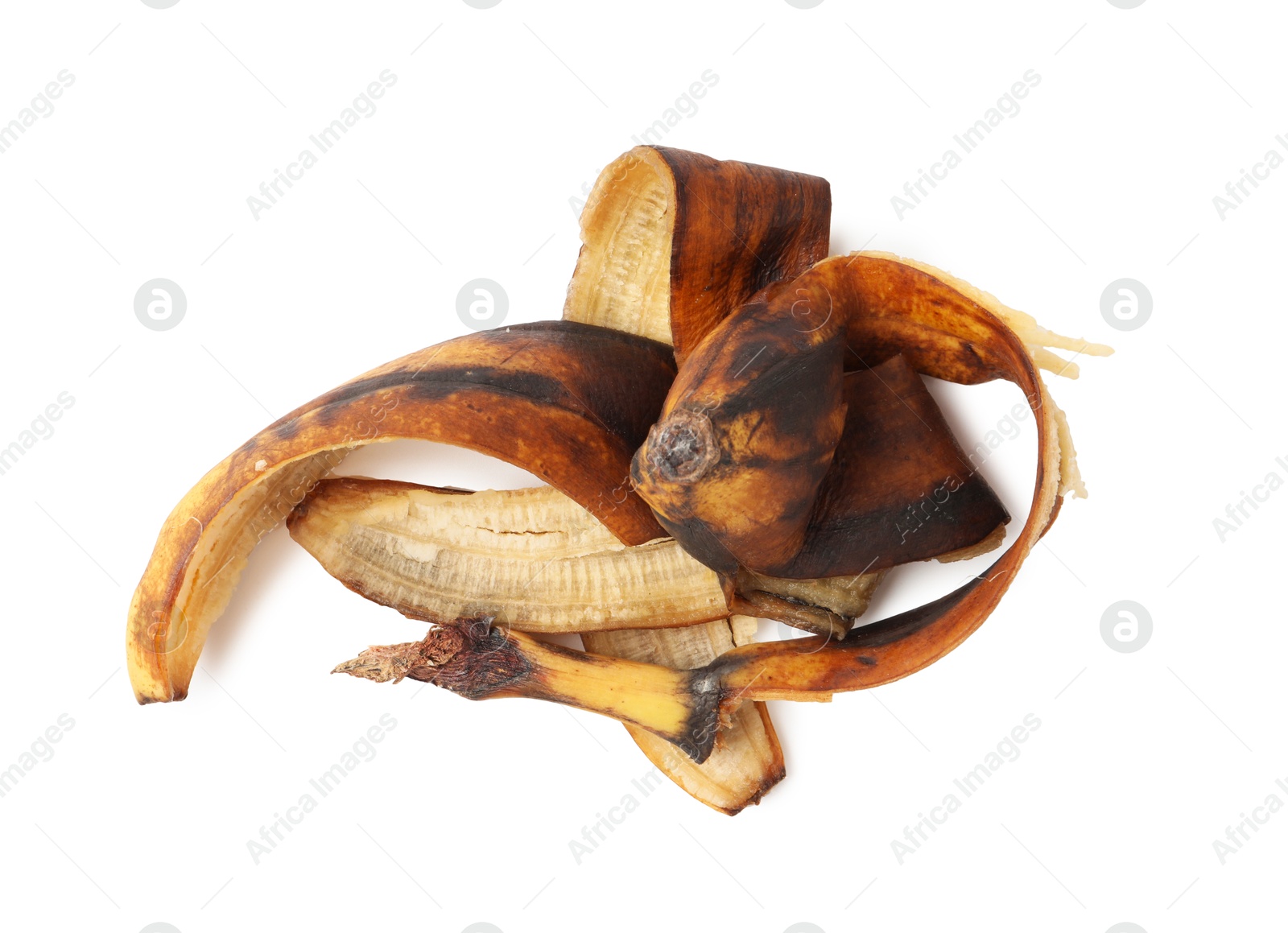 Photo of Banana peel with dark spots isolated on white, top view