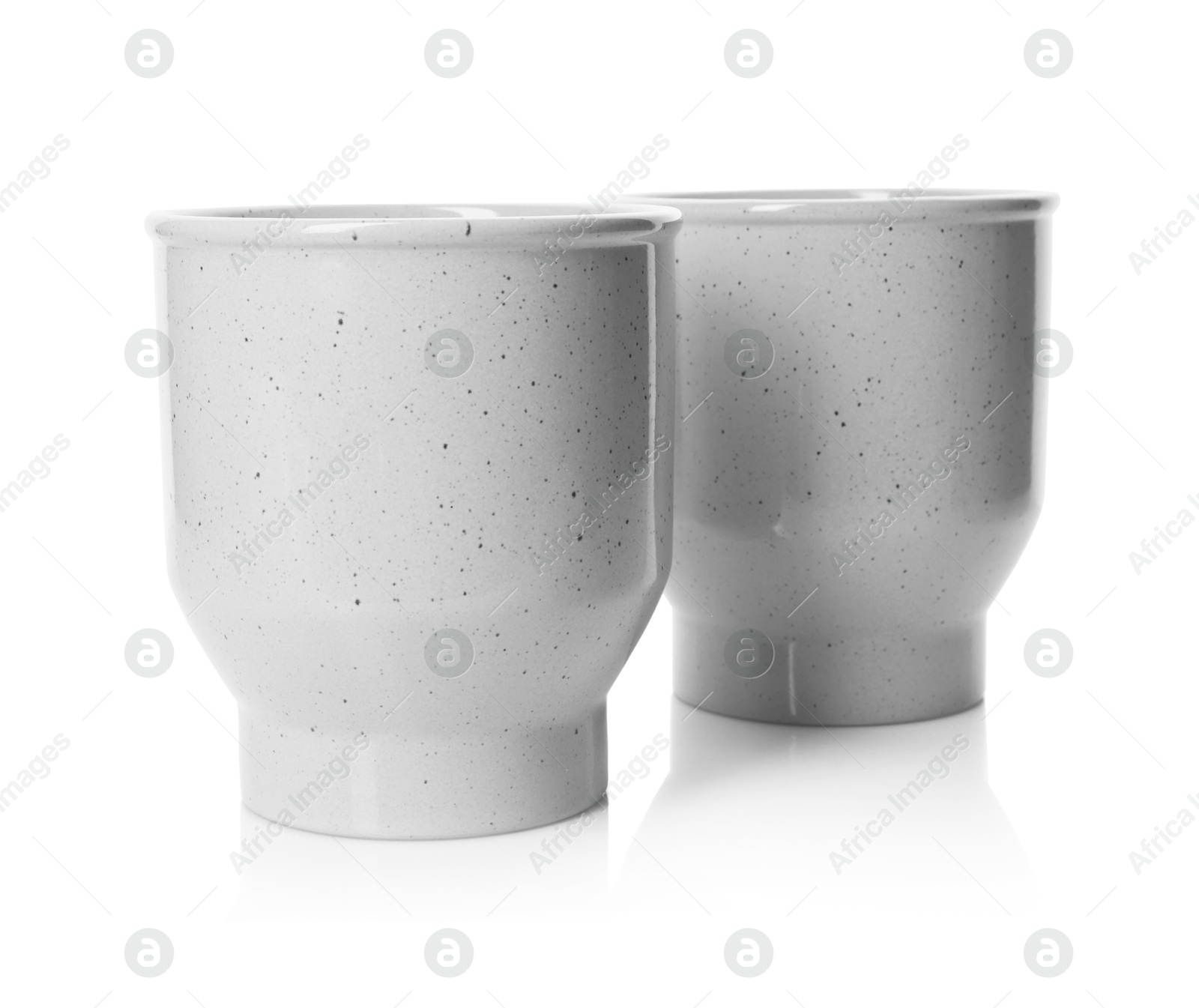 Photo of Two beautiful ceramic vases isolated on white