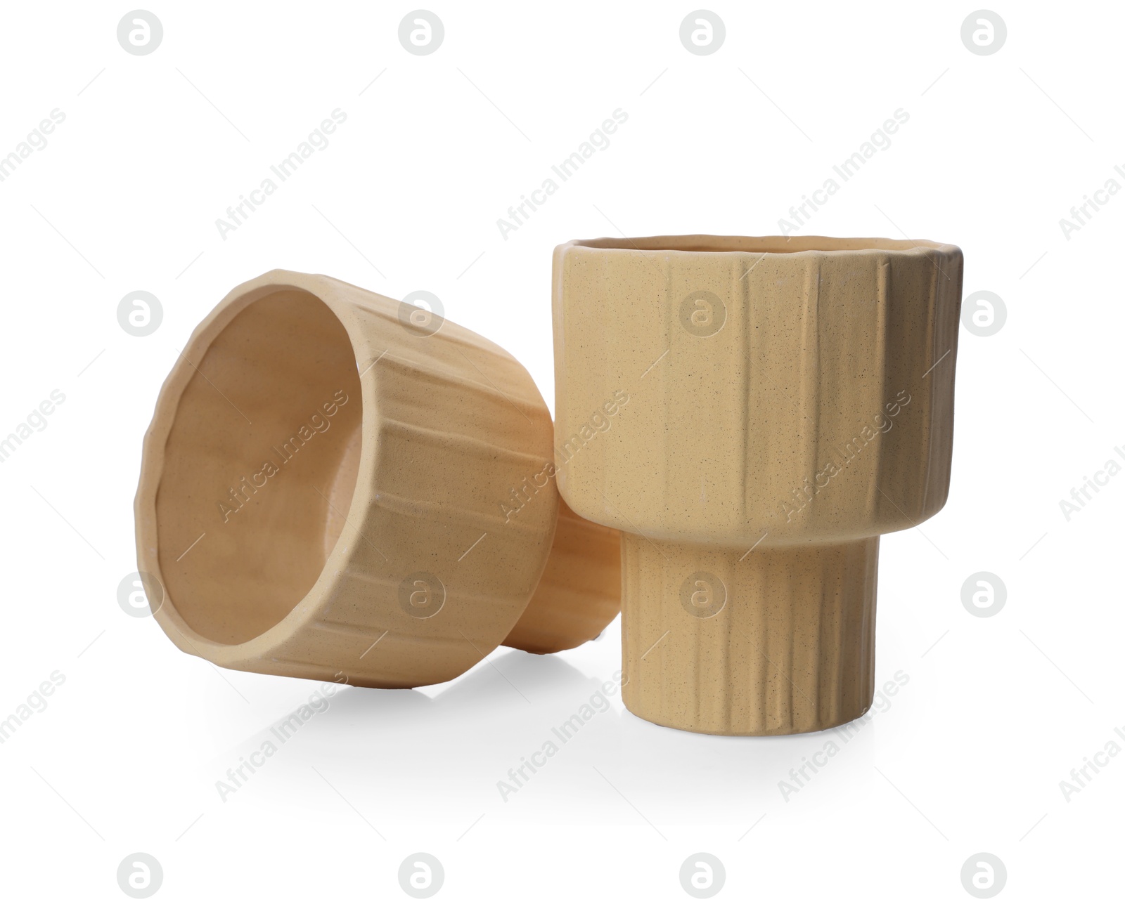 Photo of Two beige ceramic vases isolated on white