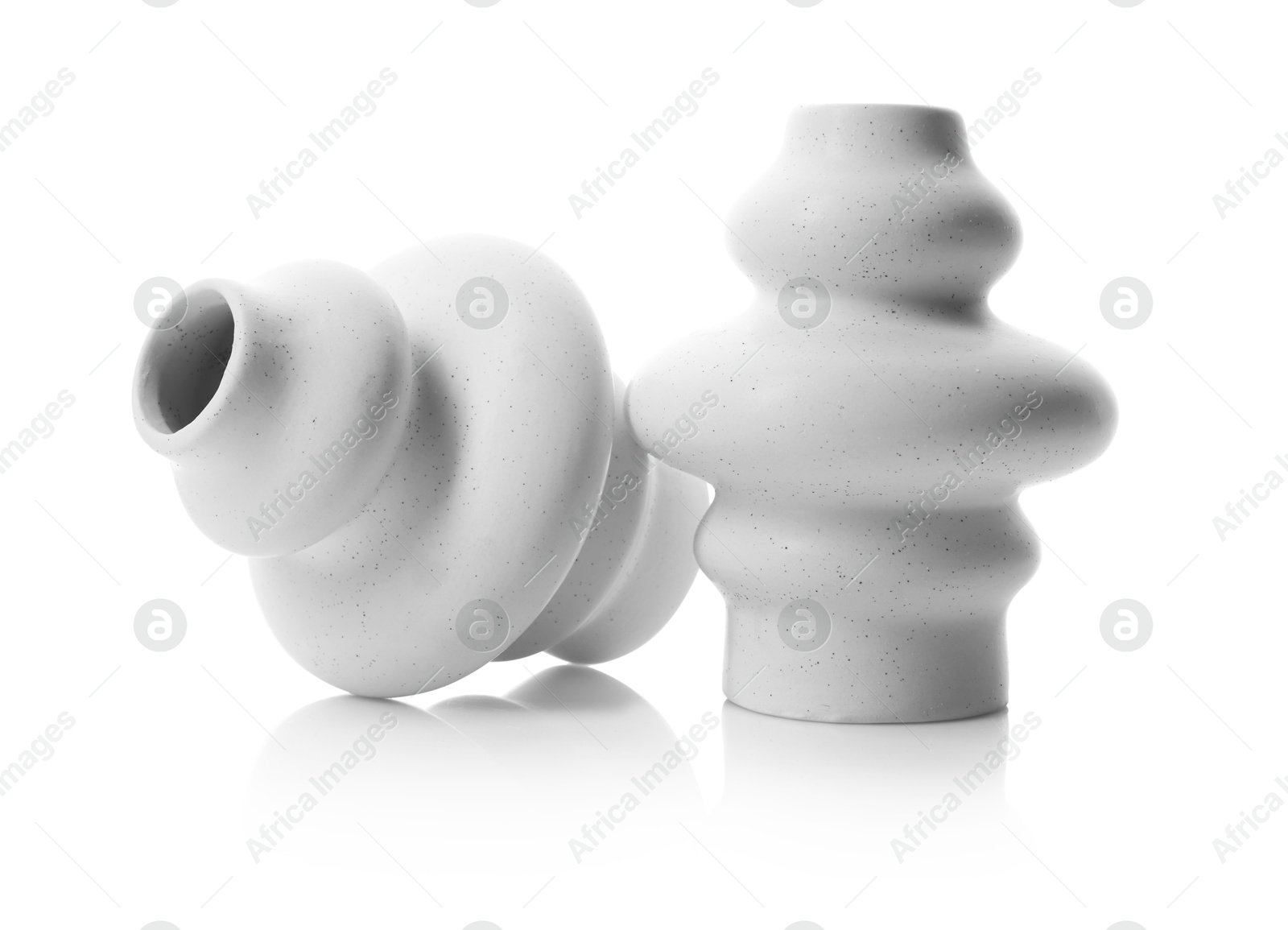 Photo of Two beautiful ceramic vases isolated on white