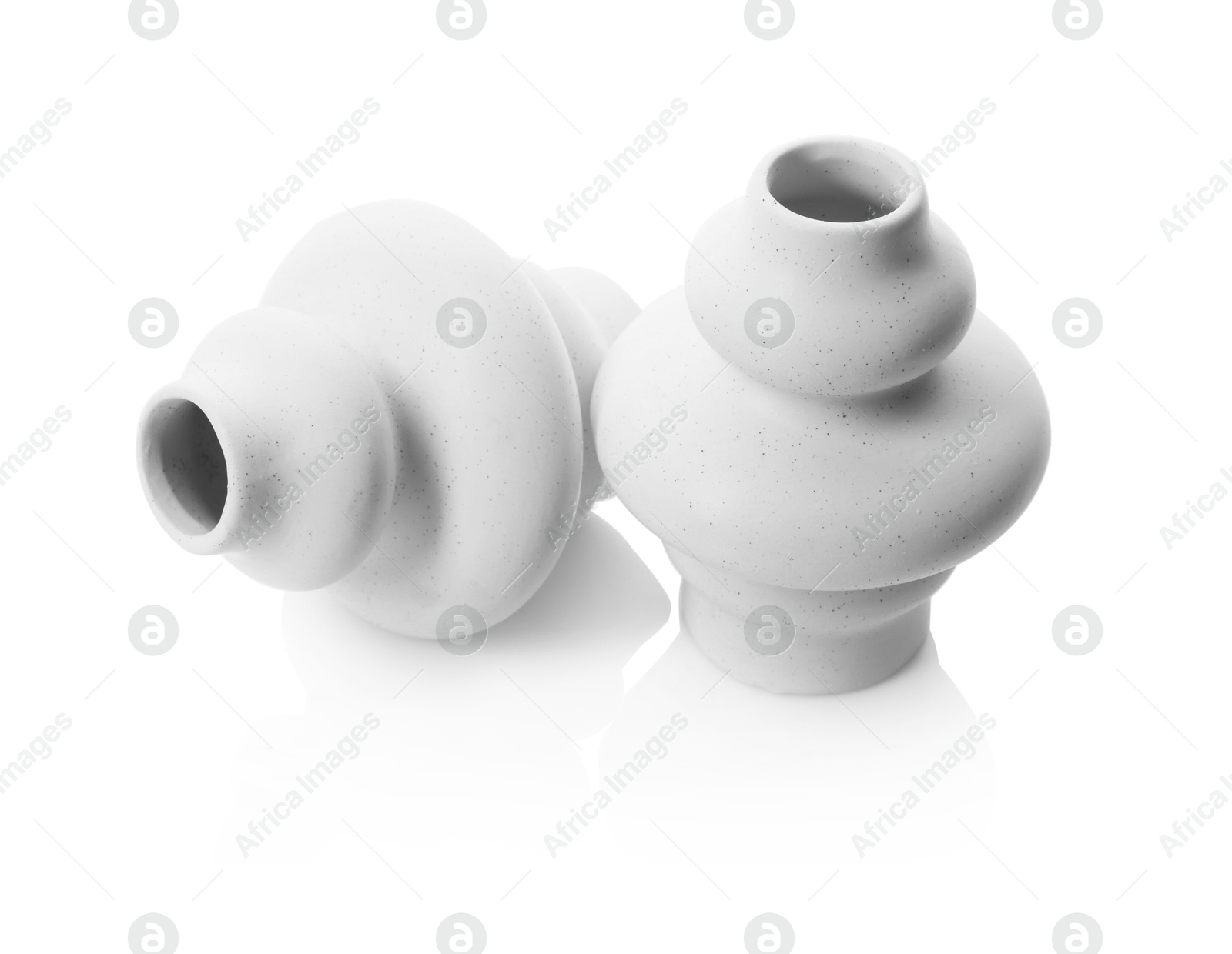 Photo of Two beautiful ceramic vases isolated on white