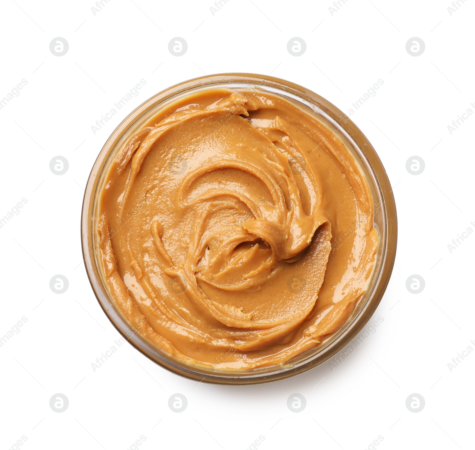 Photo of Tasty peanut butter in bowl isolated on white, top view