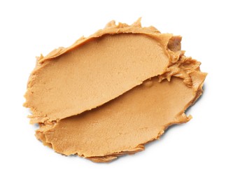 Photo of Tasty peanut butter on white background, top view