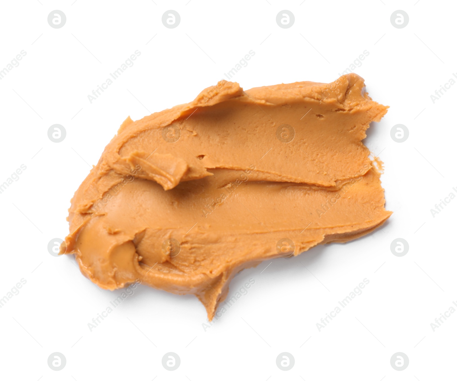 Photo of Tasty peanut butter on white background, top view