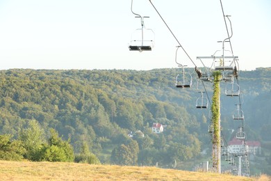 Photo of Beautiful view of ski lift at mountain resort