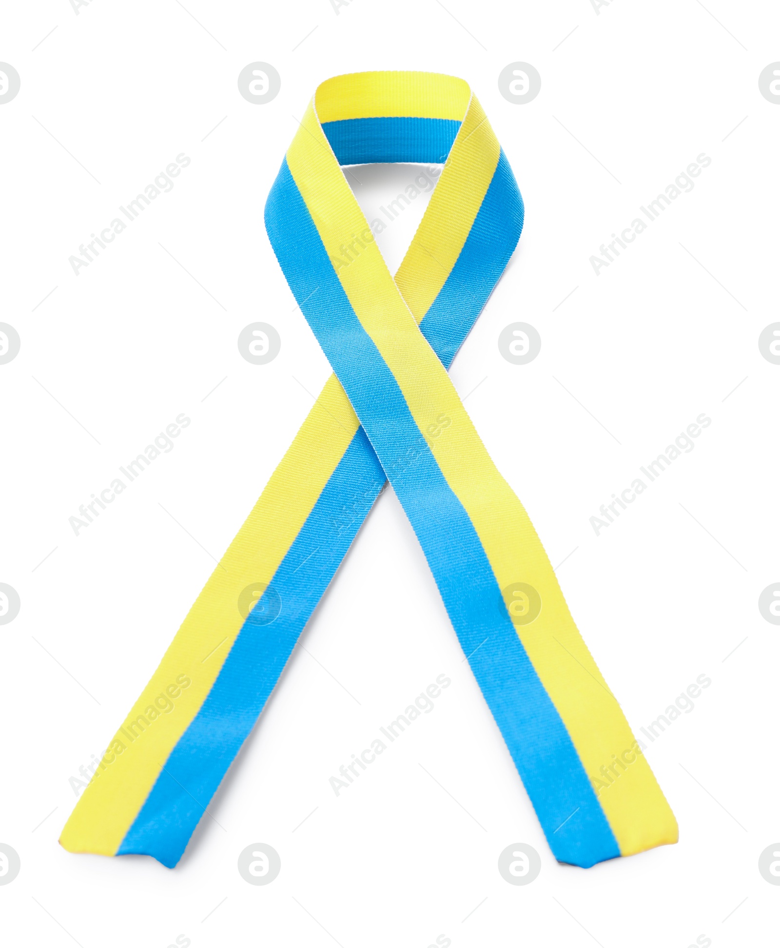 Photo of Ribbon in colors of Ukrainian national flag isolated on white, top view