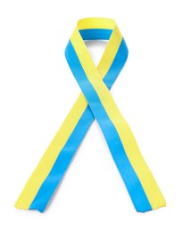 Photo of Ribbon in colors of Ukrainian national flag isolated on white, top view