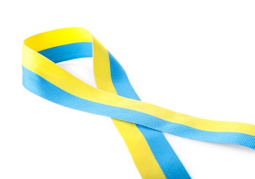 Photo of Ribbon in colors of Ukrainian national flag isolated on white