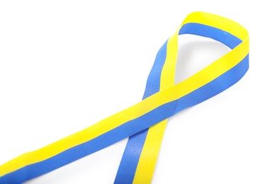 Photo of Ribbon in colors of Ukrainian national flag isolated on white