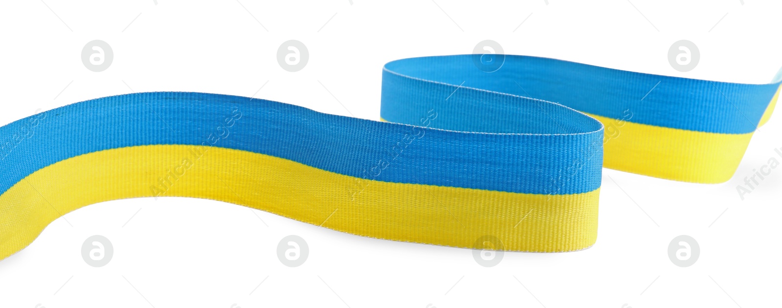 Photo of Ribbon in colors of Ukrainian national flag isolated on white