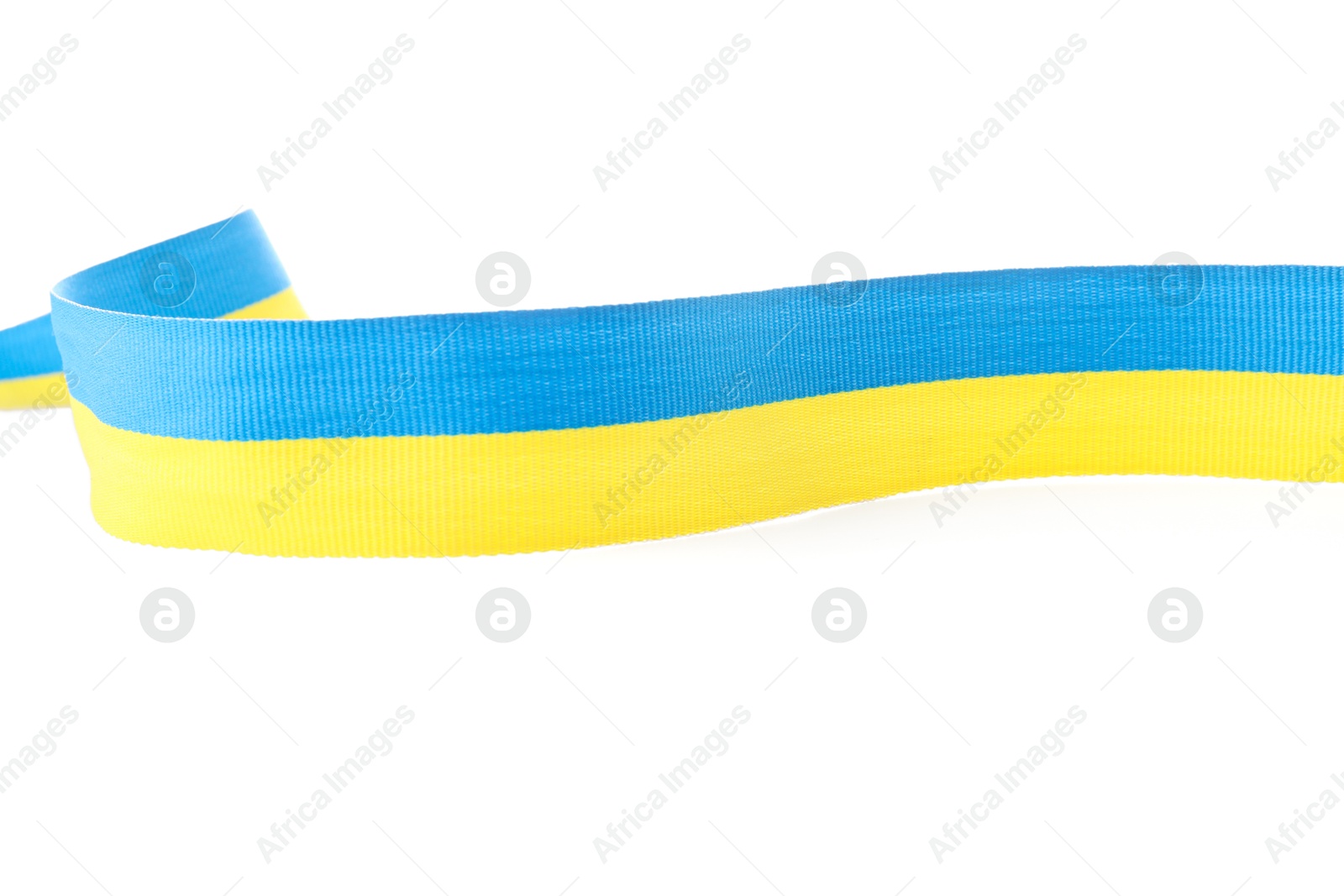 Photo of Ribbon in colors of Ukrainian national flag isolated on white