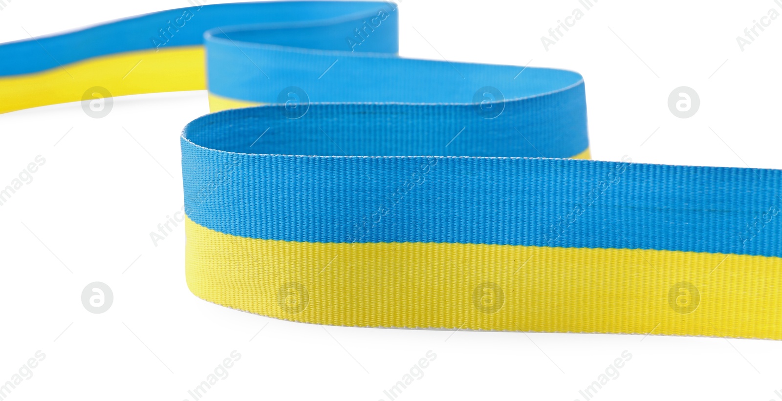 Photo of Ribbon in colors of Ukrainian national flag isolated on white