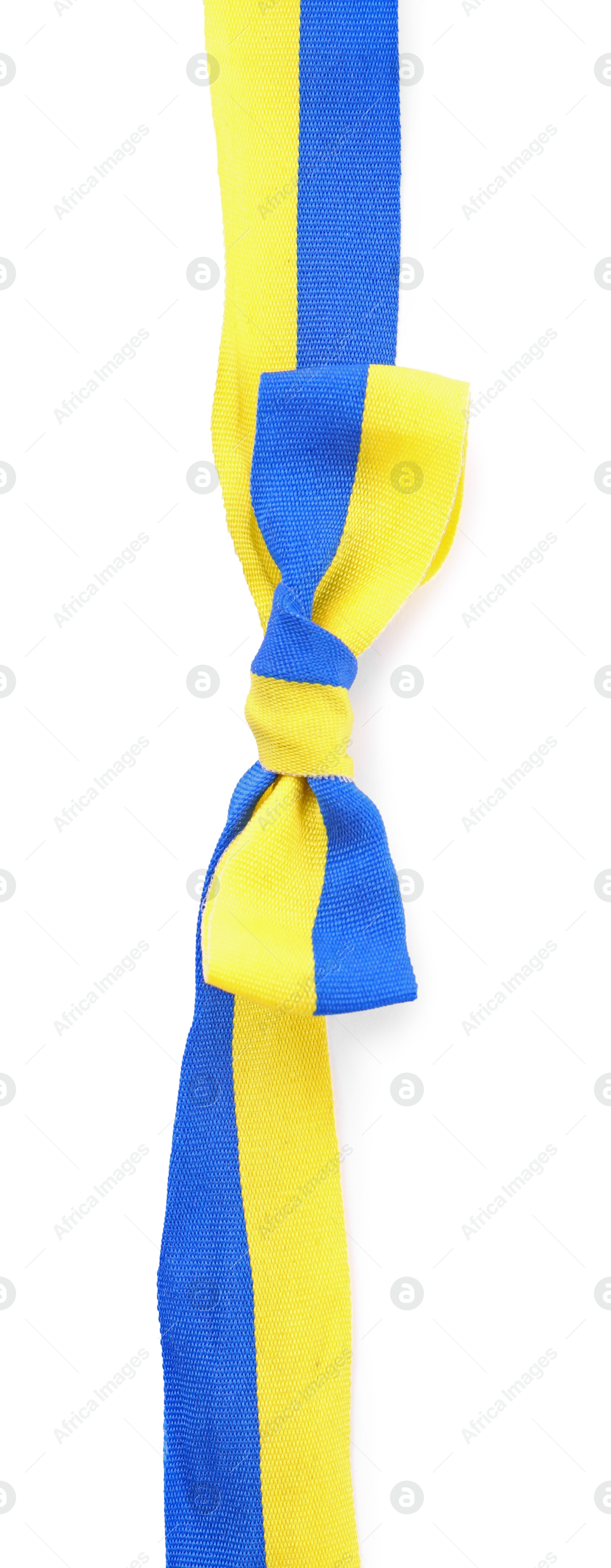 Photo of Ribbon with bow in colors of Ukrainian national flag isolated on white, top view