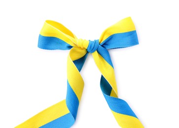 Photo of Ribbon with bow in colors of Ukrainian national flag isolated on white, top view