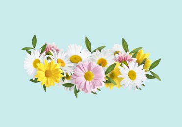 Image of Beautiful flower wreath on light blue background