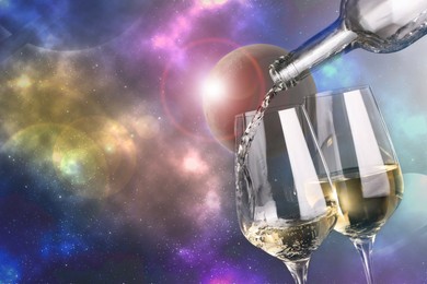 Pouring white wine into glass against colorful night sky, closeup. Space for text