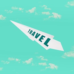 Image of Paper plane with word Travel on turquoise background with clouds