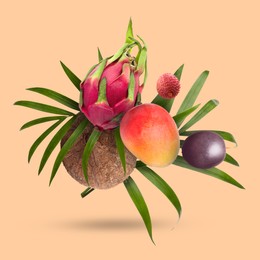 Image of Coconut, dragonfruit, mango, lychee and maracuja falling on dark beige background. Tropical fruits