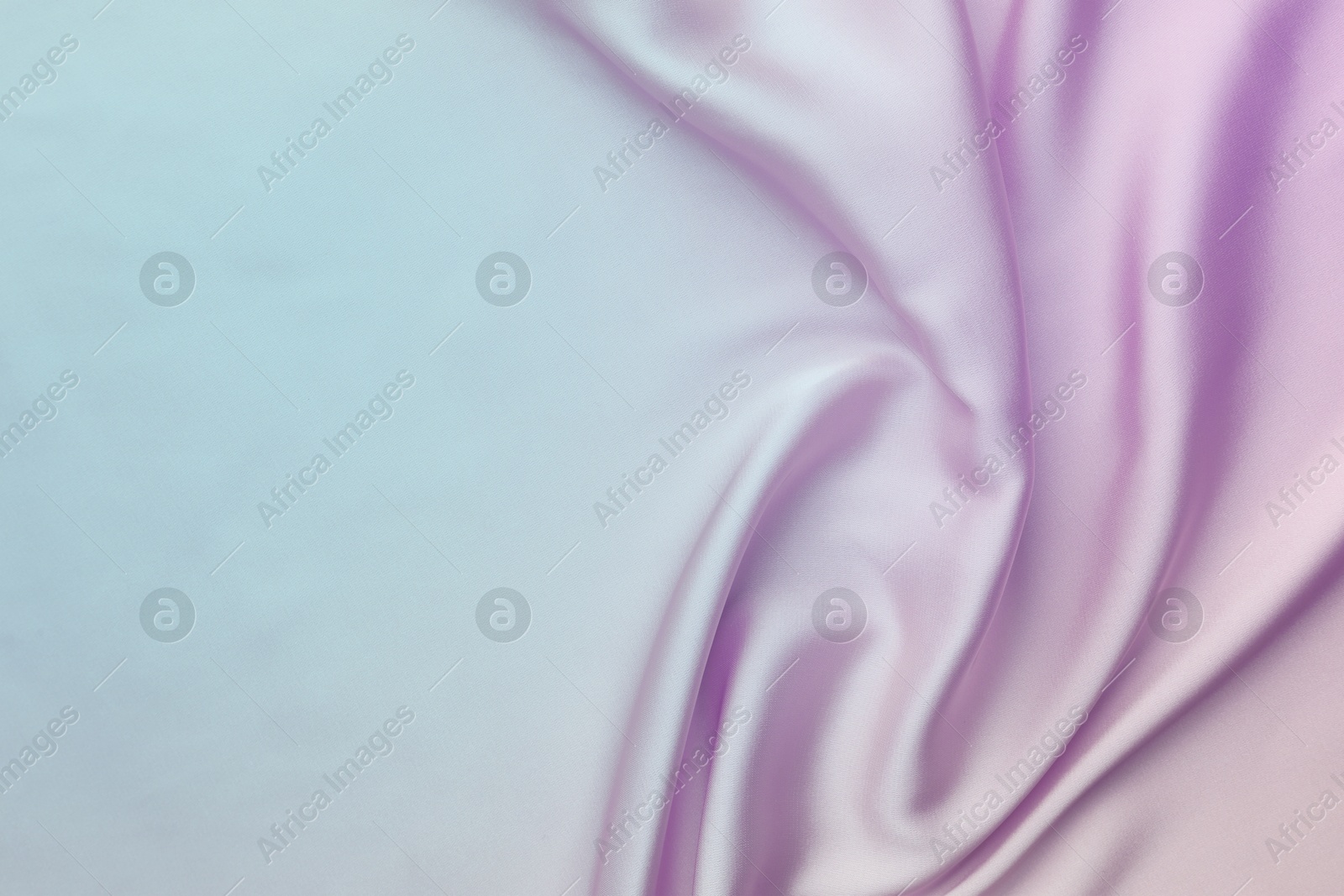 Image of Beautiful silk fabric with color gradient, top view