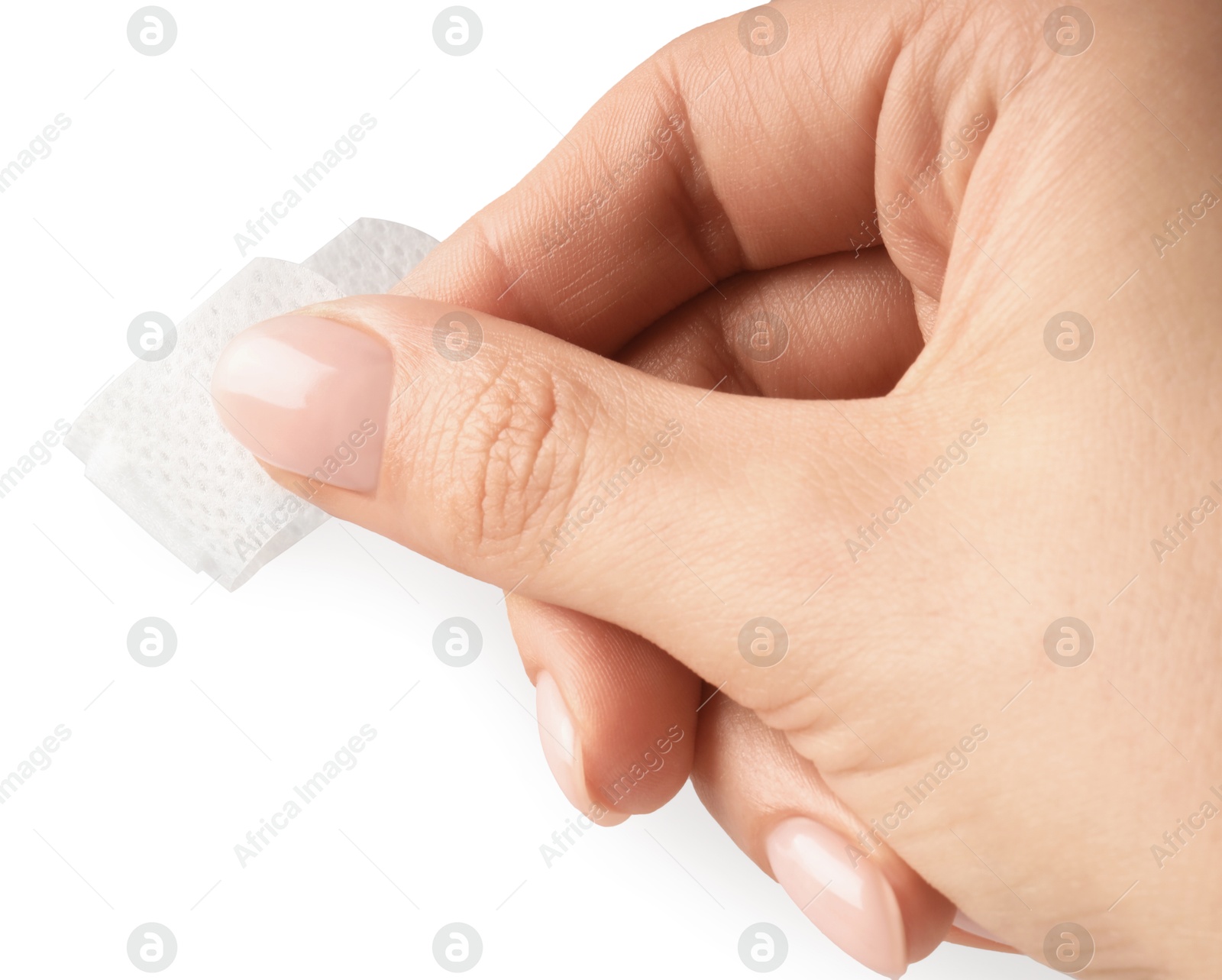 Woman putting medical adhesive bandage on white background, closeup Photo of Woman putting medical adhesive bandage on white background, closeup