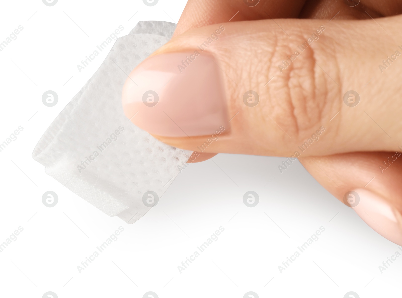 Woman putting medical adhesive bandage on white background, closeup Photo of Woman putting medical adhesive bandage on white background, closeup