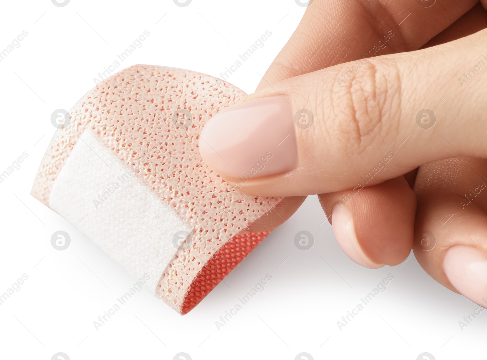 Woman putting medical adhesive bandage on white background, closeup Photo of Woman putting medical adhesive bandage on white background, closeup