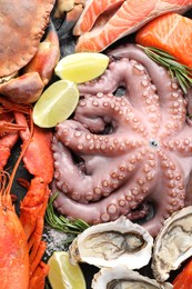 Photo of Many different sea food as background, top view