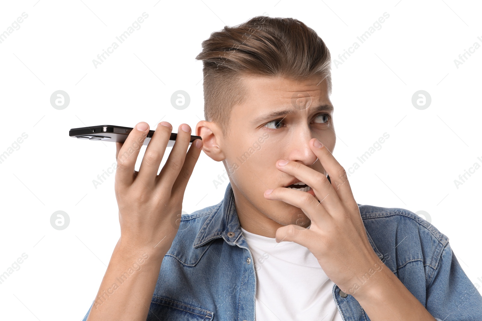 Photo of Young man with smartphone listening to voice message on white background