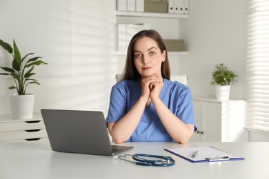 Photo of Portrait of nurse at workplace in hospital