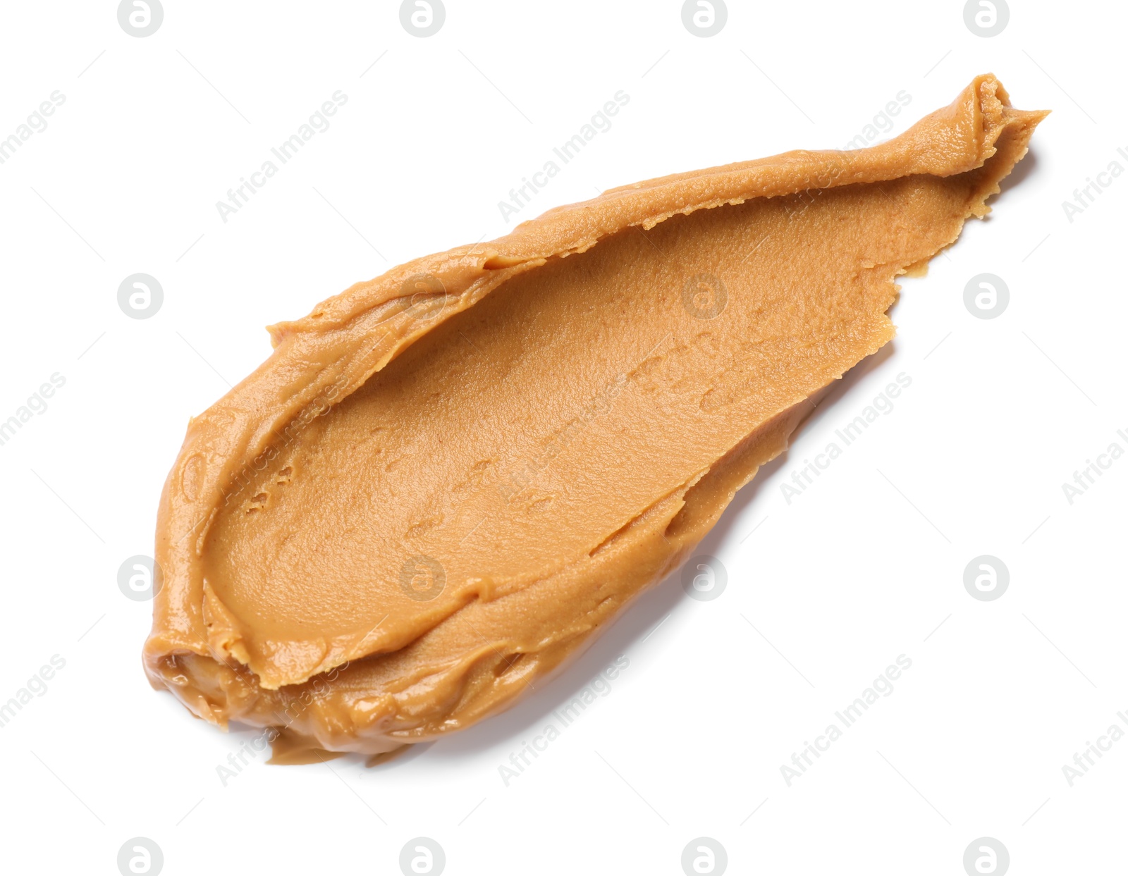 Photo of Tasty peanut butter on white background, top view