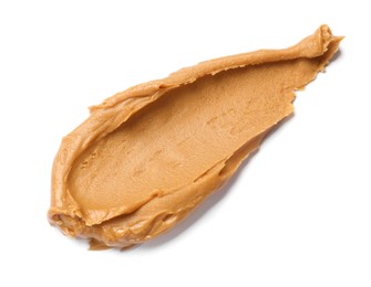 Photo of Tasty peanut butter on white background, top view