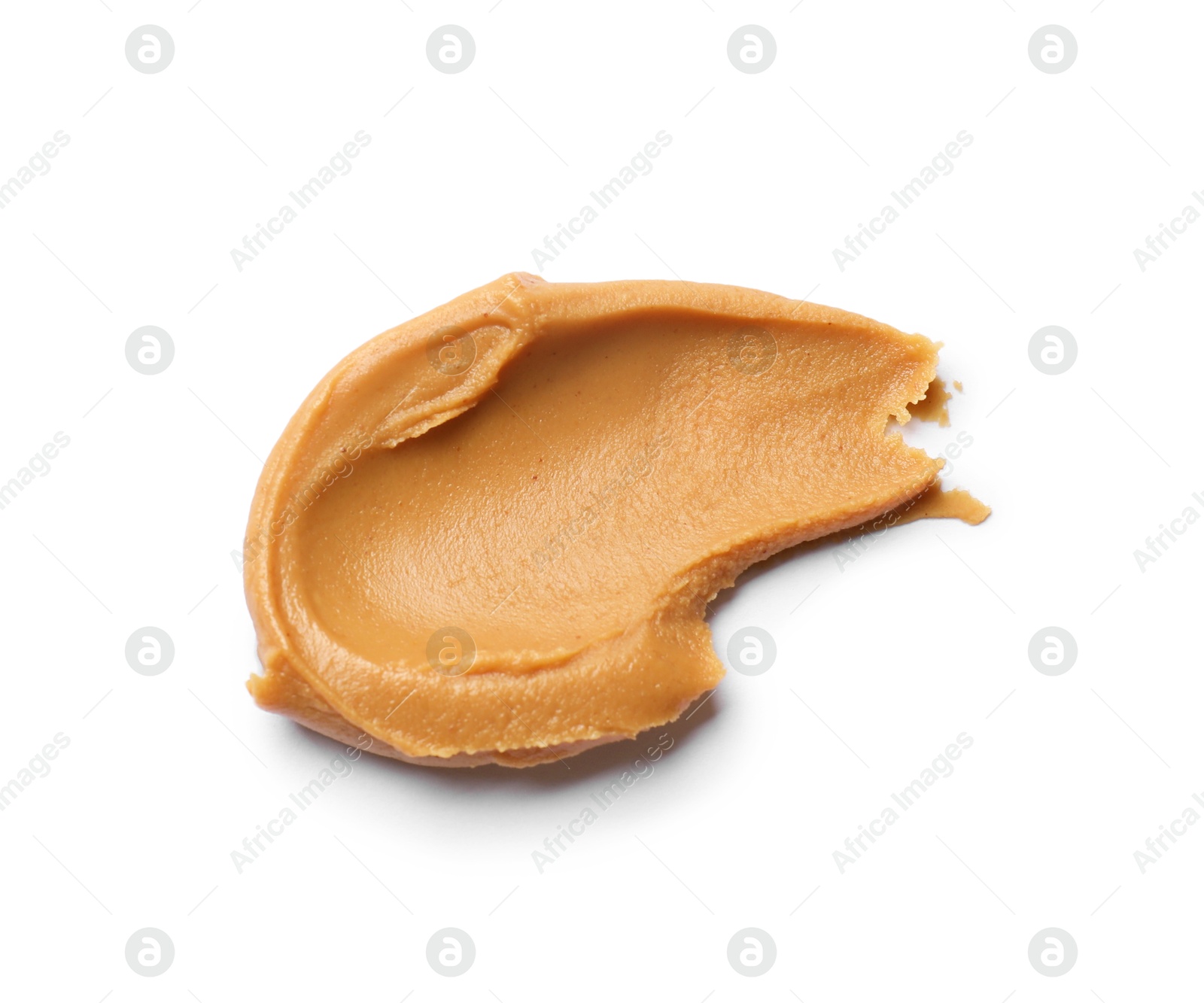 Photo of Tasty peanut butter on white background, top view