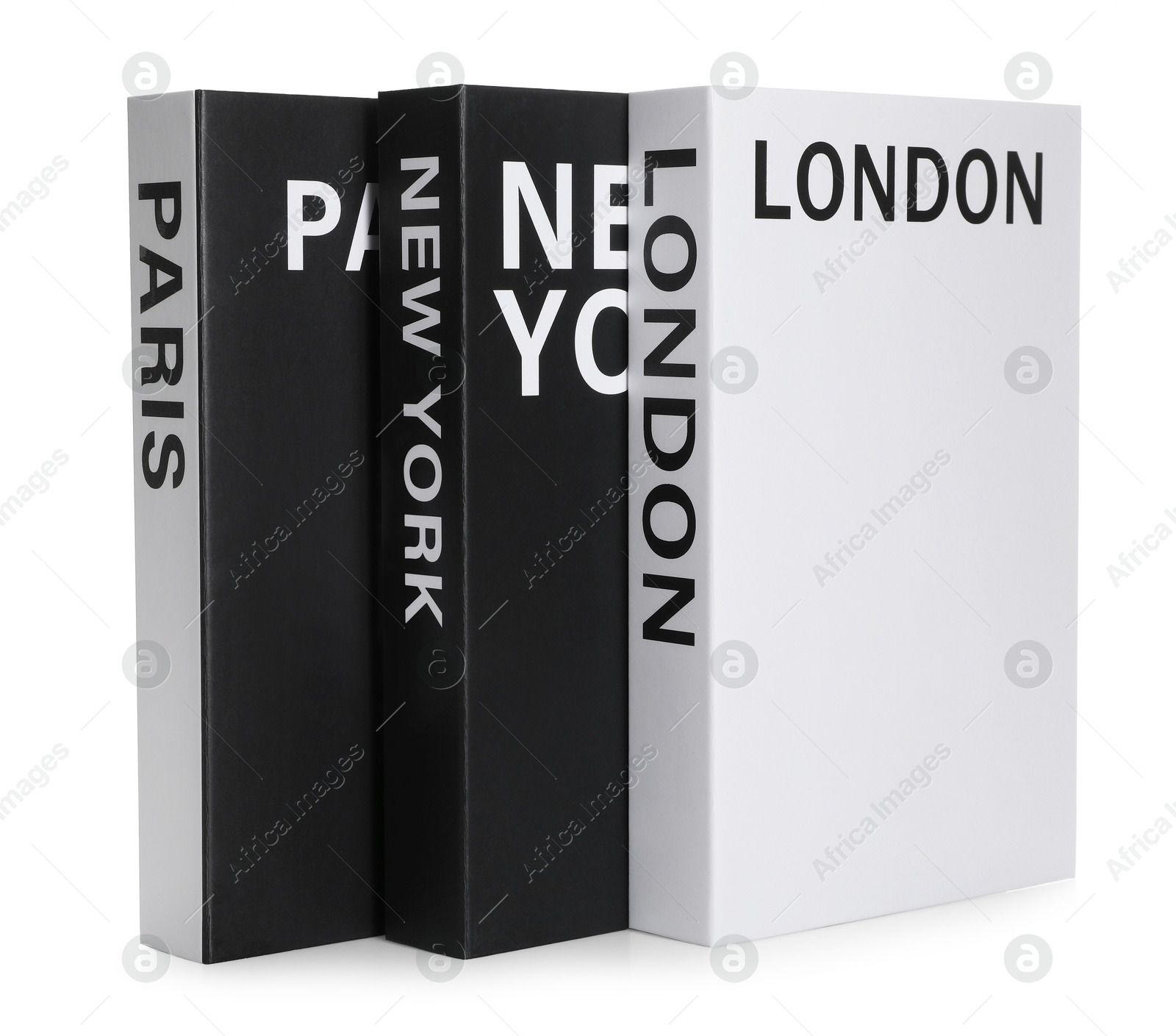 Photo of Hardcover books with different cities names isolated on white