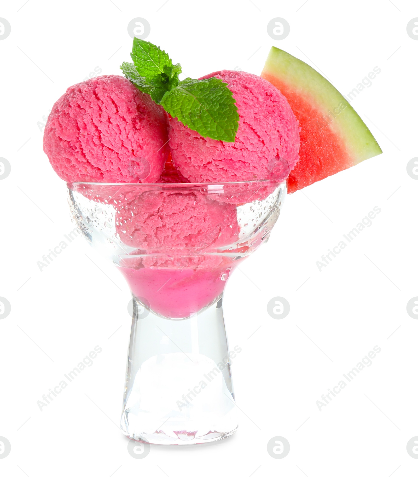 Photo of Scoops of tasty watermelon sorbet in glass dessert bowl, fresh fruit and mint isolated on white