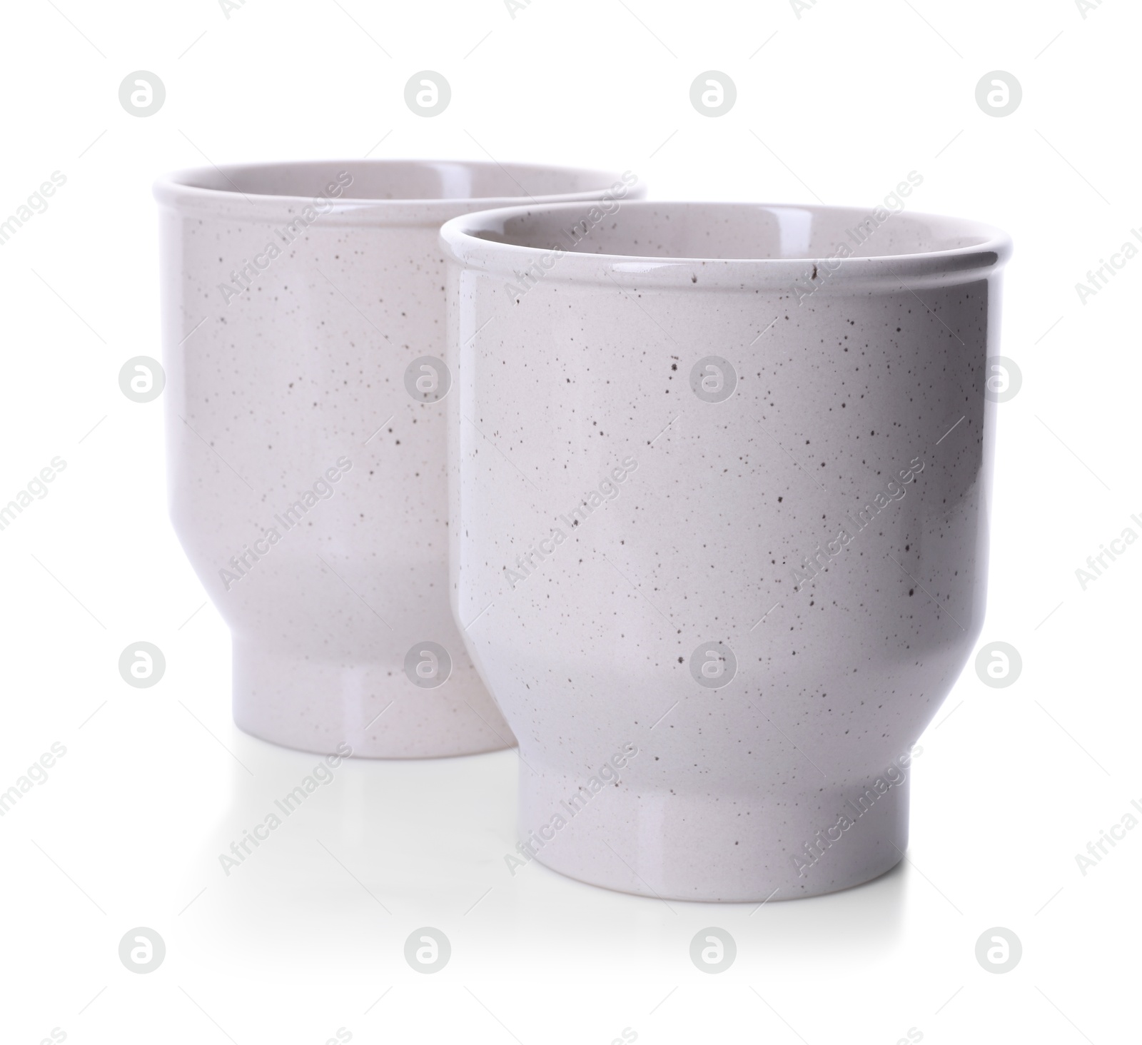 Photo of Two beautiful ceramic vases isolated on white