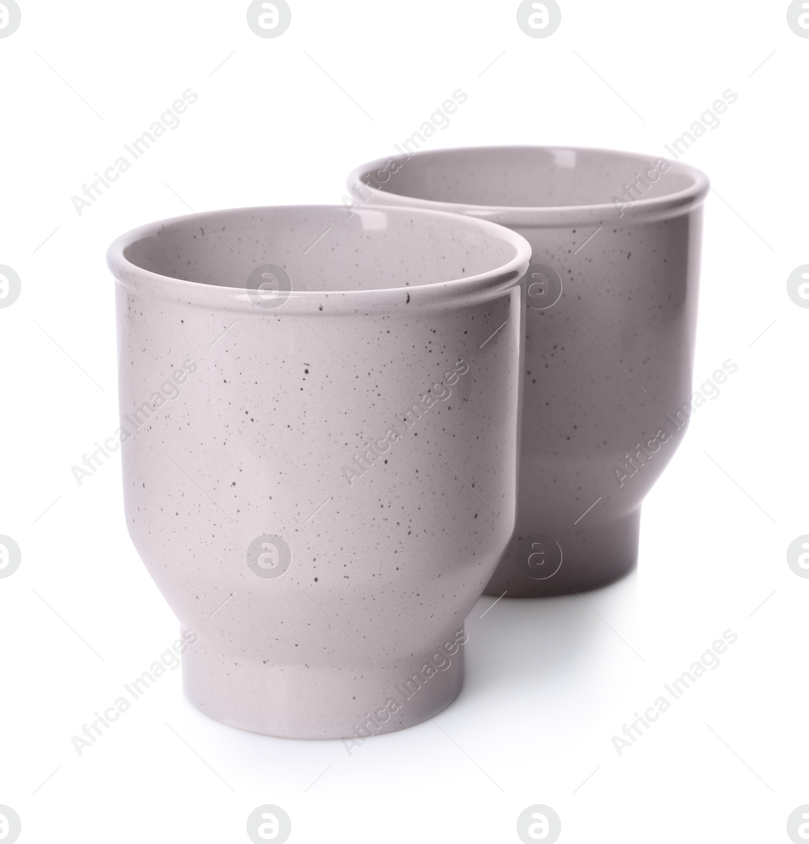 Photo of Two beautiful ceramic vases isolated on white