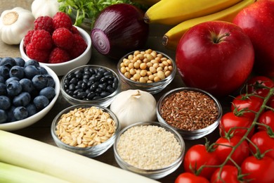 Photo of Different fresh products on table, closeup. Source of prebiotics