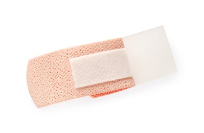 Photo of One medical adhesive bandage isolated on white, top view
