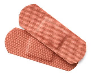 Photo of Medical adhesive bandages isolated on white, top view