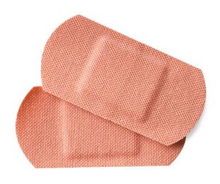 Photo of Medical adhesive bandages isolated on white, top view