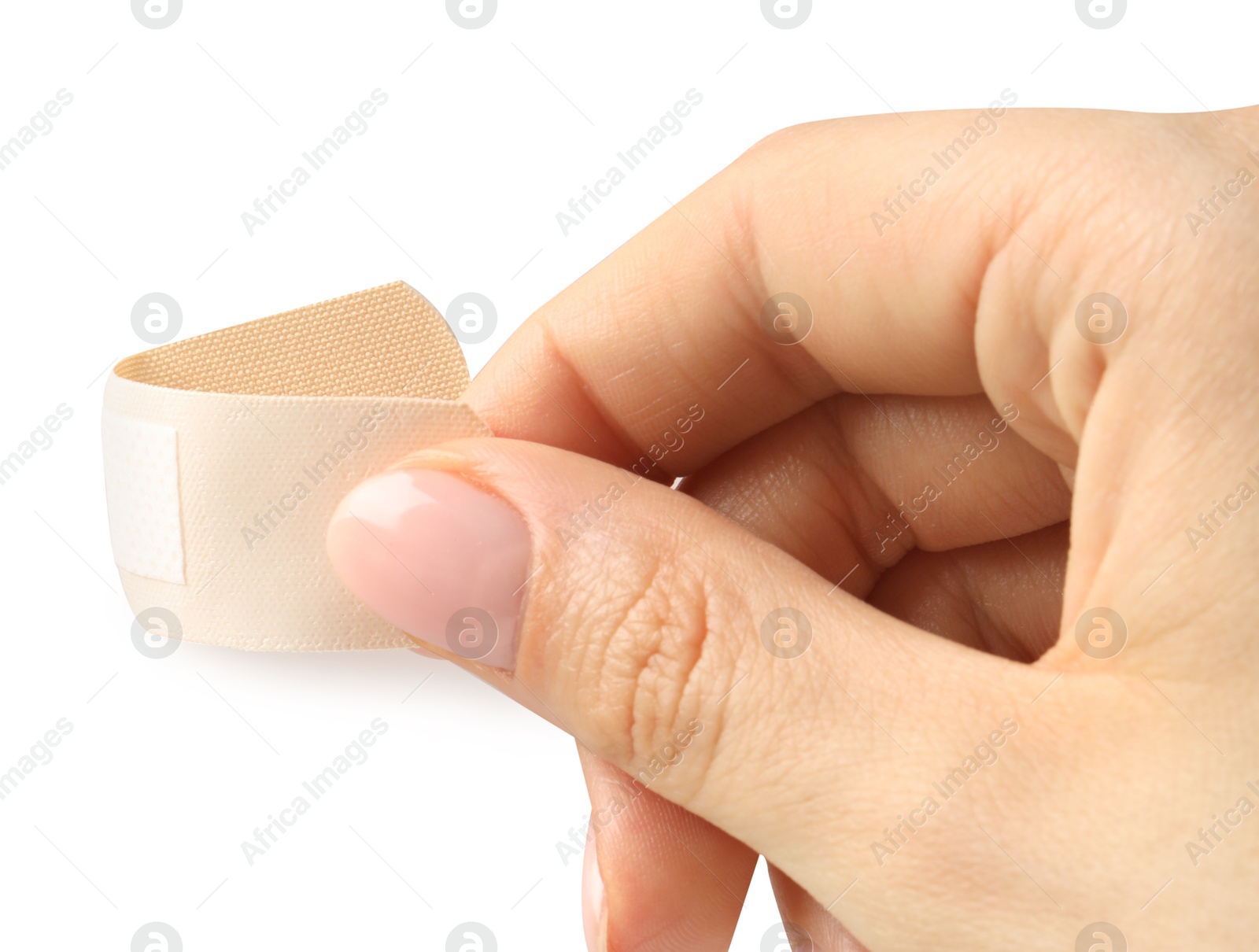 Woman putting medical adhesive bandage on white background, closeup Photo of Woman putting medical adhesive bandage on white background, closeup