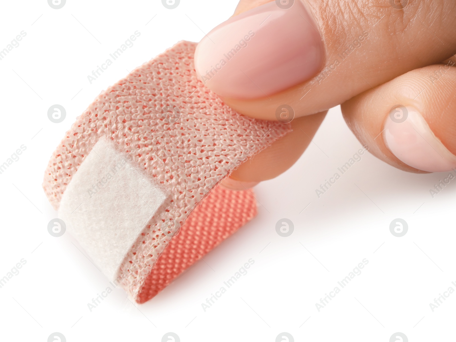 Woman putting medical adhesive bandage on white background, closeup Photo of Woman putting medical adhesive bandage on white background, closeup