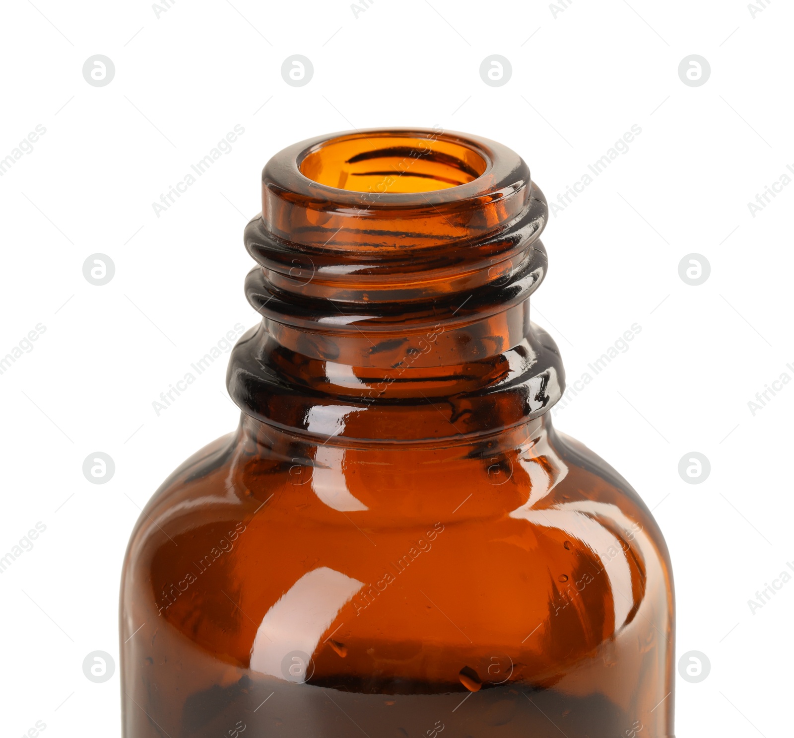 Photo of Bottle of essential oil isolated on white